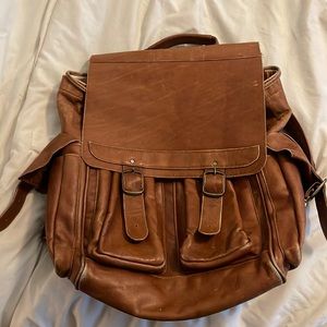 Amazing vintage 70’s leather backpack.  Back straps can also be hidden.
